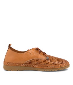 WONDERS CF TAN LEATHER