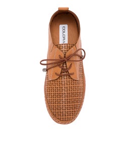 WONDERS CF TAN LEATHER