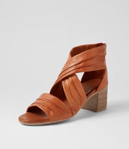 WIVES DF TAN LEATHER
