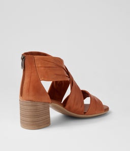 WIVES DF TAN LEATHER