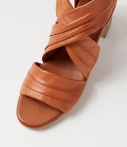 WIVES DF TAN LEATHER