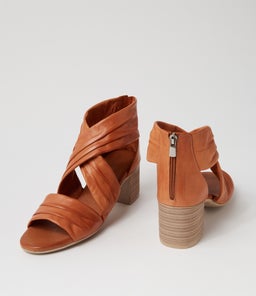 WIVES DF TAN LEATHER